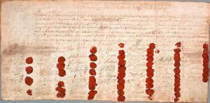 The death warrant of Charles I, showing the seals of the 59 signatories. Many others refused to sign it.
